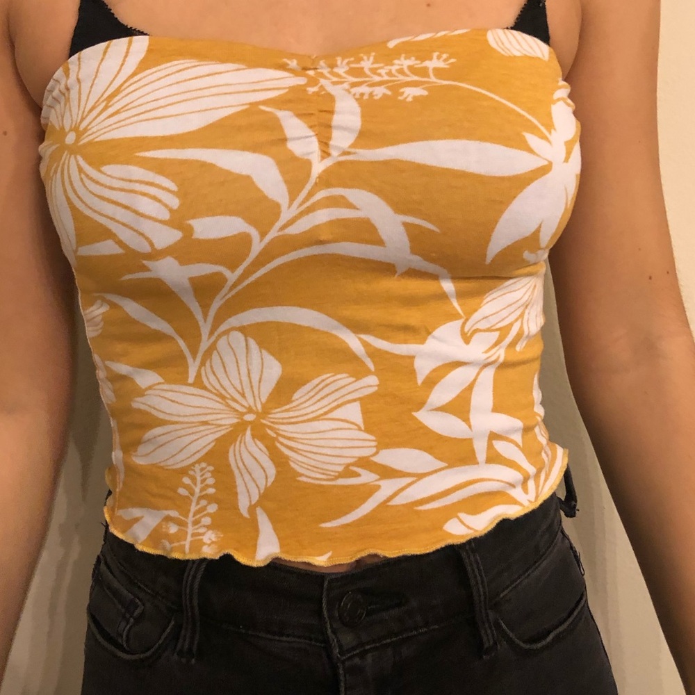 Yellow floral tube top.